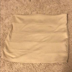 Size M- Tan mini skirt from Body Central